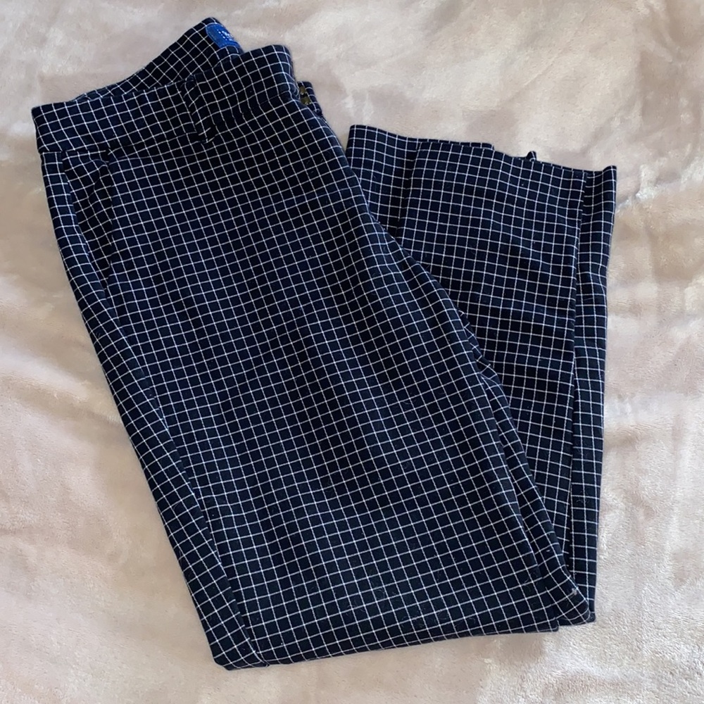 Mid-Rise, slim leg work pants.